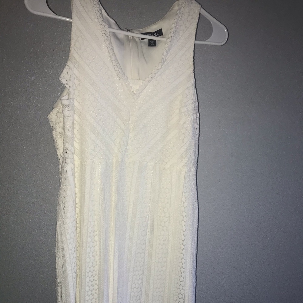 White dress slightly ripped but can be sowed